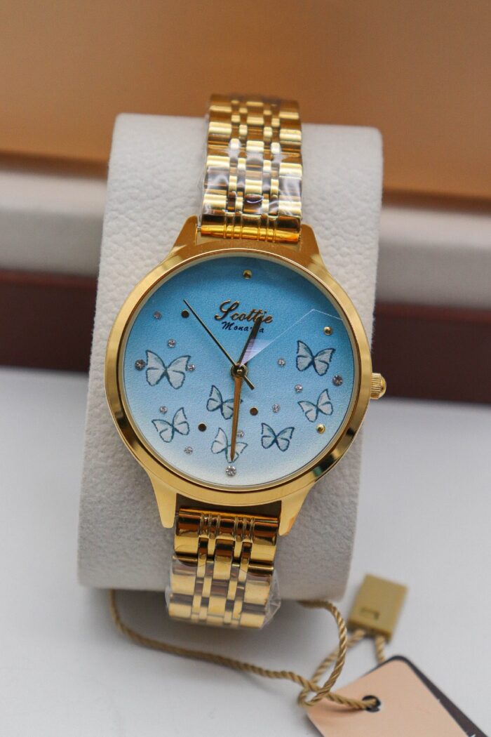 Reloj Dorado Fondo Azul Claro